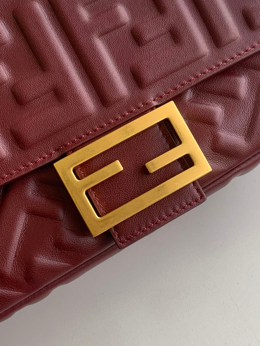 FENDI Fend Baguette 27 Bag With FF Motif Burgundy Leather Ghw