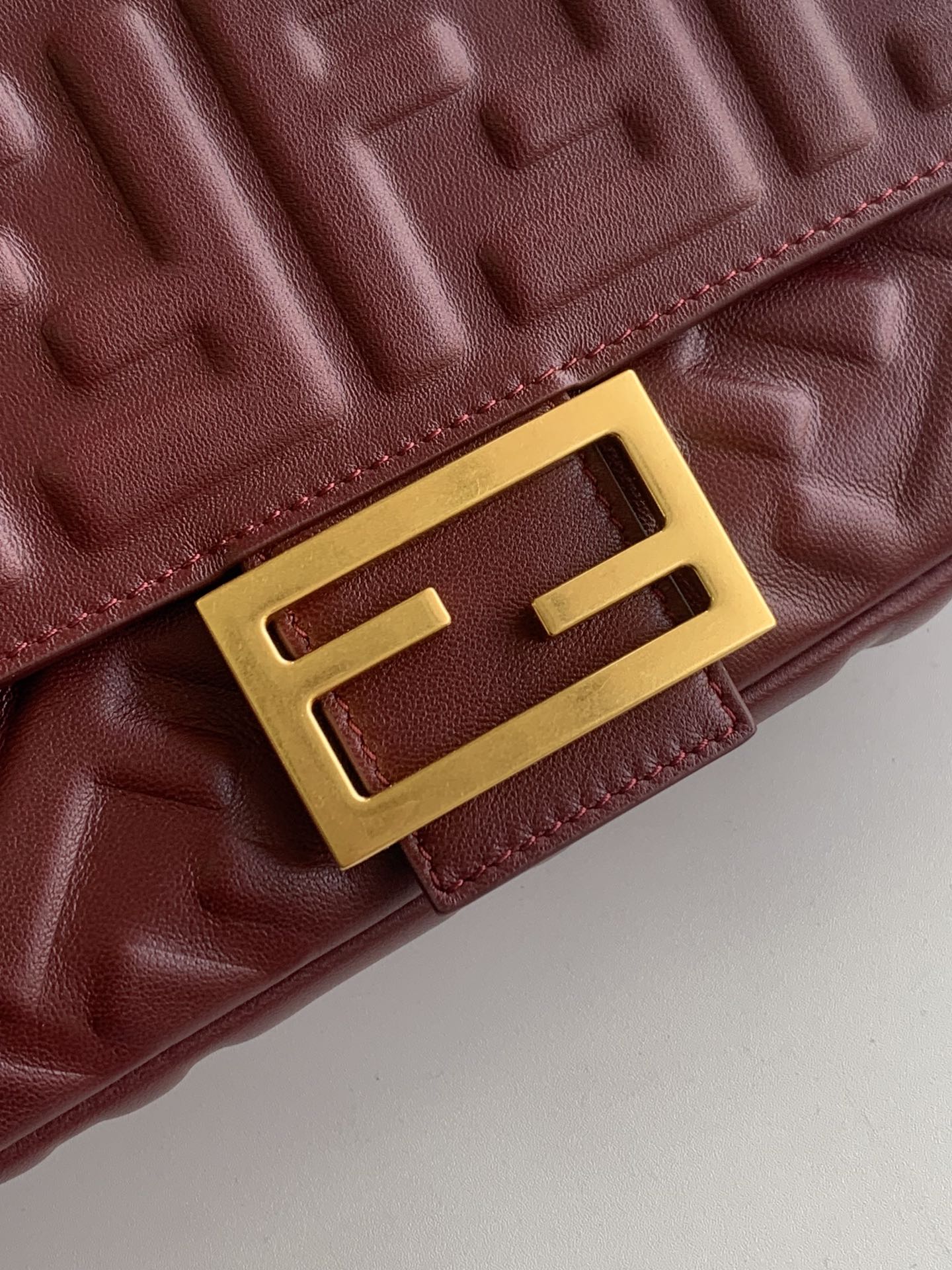 FENDI Fend Baguette 27 Bag With FF Motif Burgundy Leather Ghw