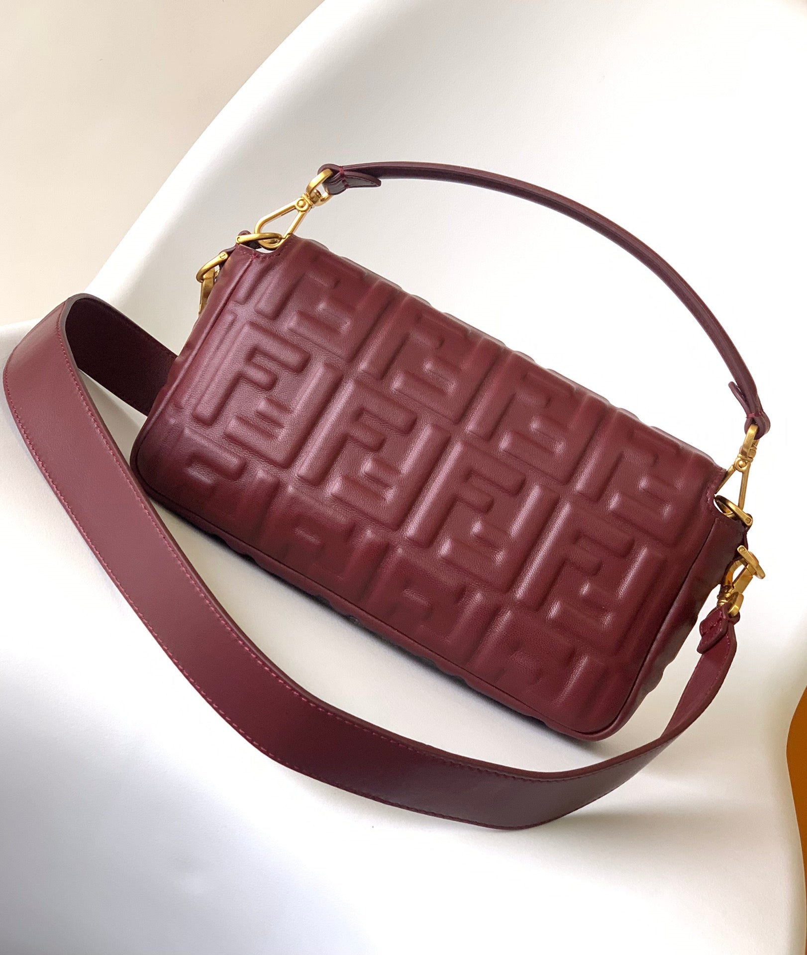FENDI Fend Baguette 27 Bag With FF Motif Burgundy Leather Ghw
