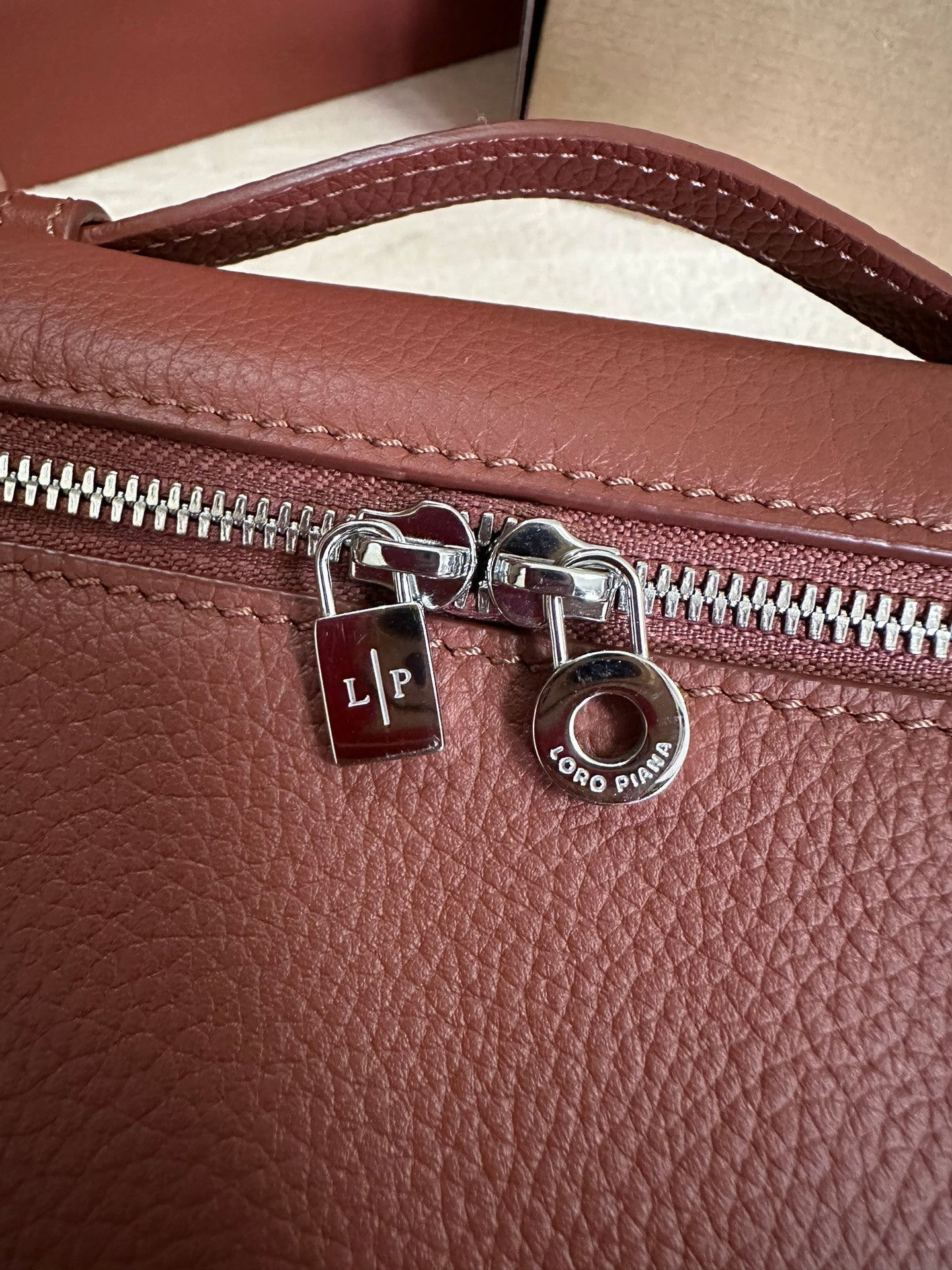 LORO PIANA EXTRA POCKET L19 IN GARNET RED CALFSKIN WITH SILVER HARDWARE