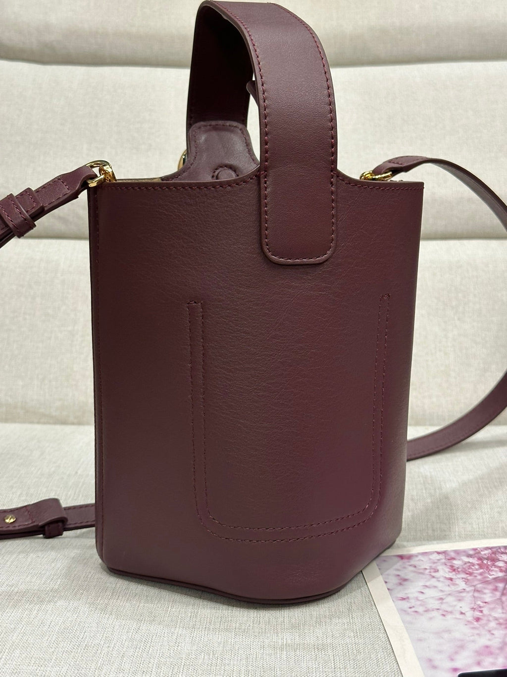 LOEWE LOE MINI 19 PEBBLE BUCKET IN DARK BURGUNDY MELLOW CALFSKIN