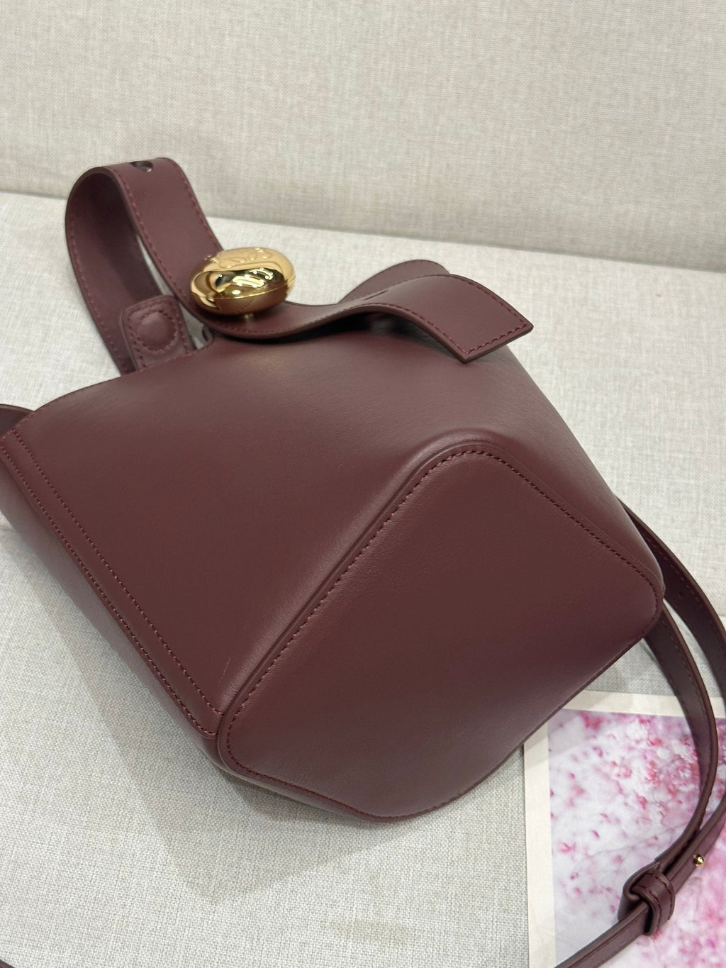 LOEWE LOE MINI 19 PEBBLE BUCKET IN DARK BURGUNDY MELLOW CALFSKIN