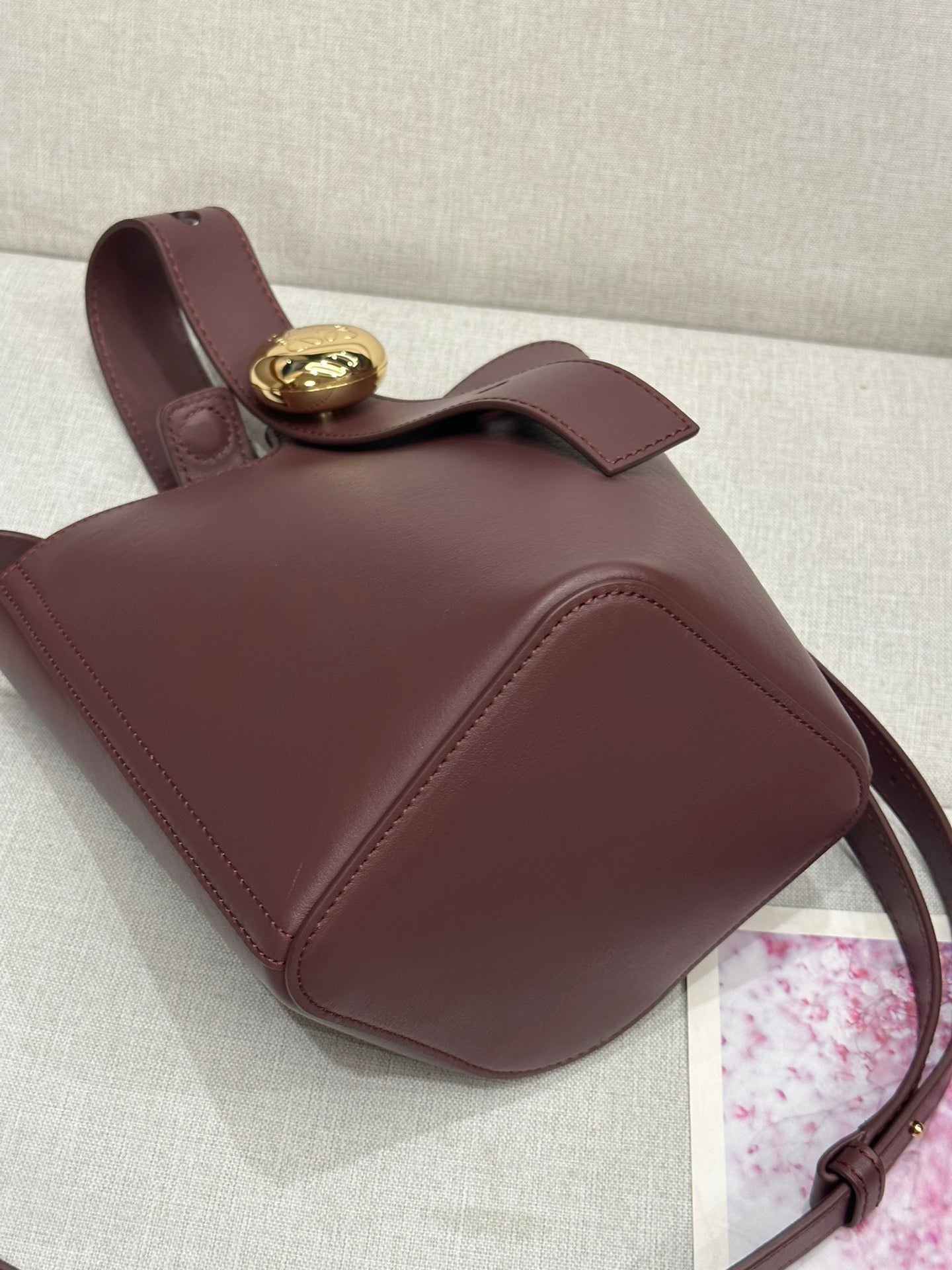LOEWE LOE MINI 19 PEBBLE BUCKET IN DARK BURGUNDY MELLOW CALFSKIN