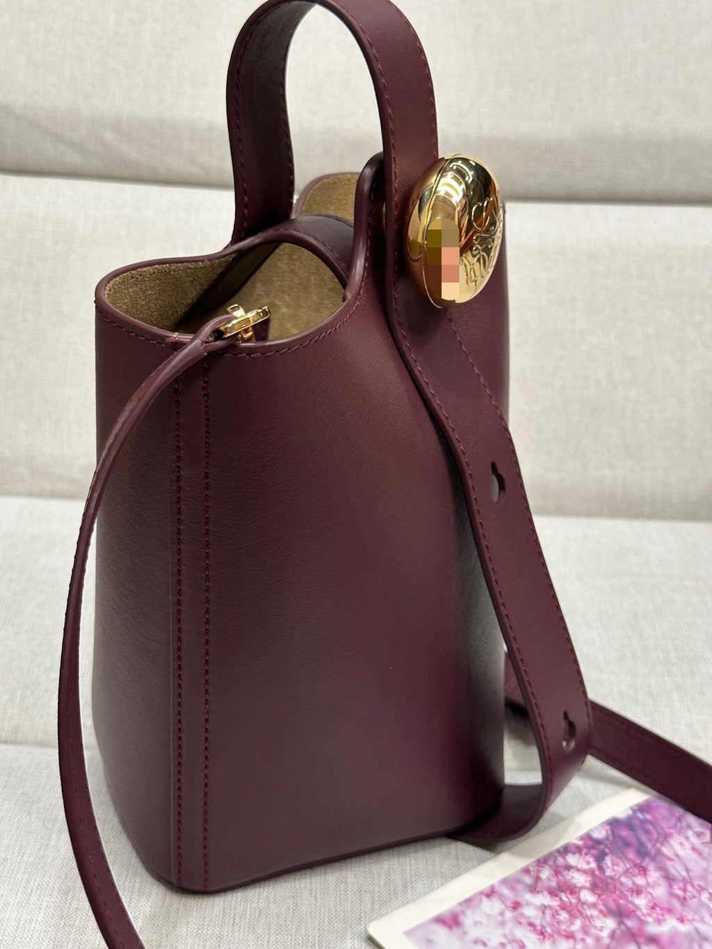LOEWE LOE MINI 19 PEBBLE BUCKET IN DARK BURGUNDY MELLOW CALFSKIN
