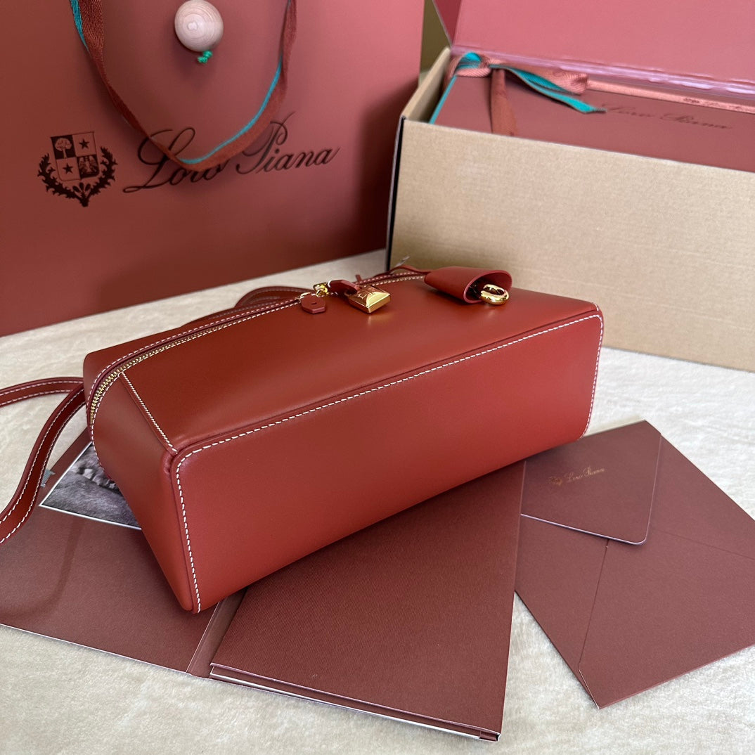 LORO PIANA EXTRA BAG L27 IN MARS RED SMOOTH CALFSKIN WITH GOLD HARDWARE