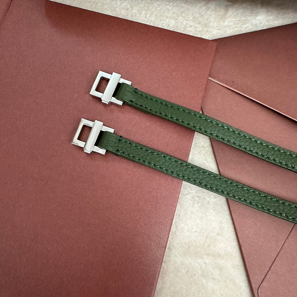 LORO PIANA EXTRA POCKET BACKPACK L23.5 IN PINE GREEN CALFSKIN WITH SILVER HARDWARE