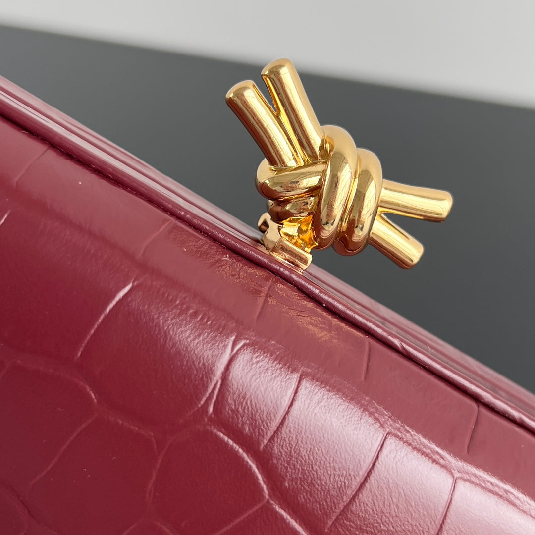 BOTTEGA VENETA KNOT 19 IN BURGUNDY RED CROCODILE PATTERN CALFSKIN