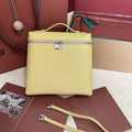 LORO PIANA EXTRA POCKET BACKPACK L23.5 IN LIGHT YELLOW CALFSKIN WITH SILVER HARDWARE