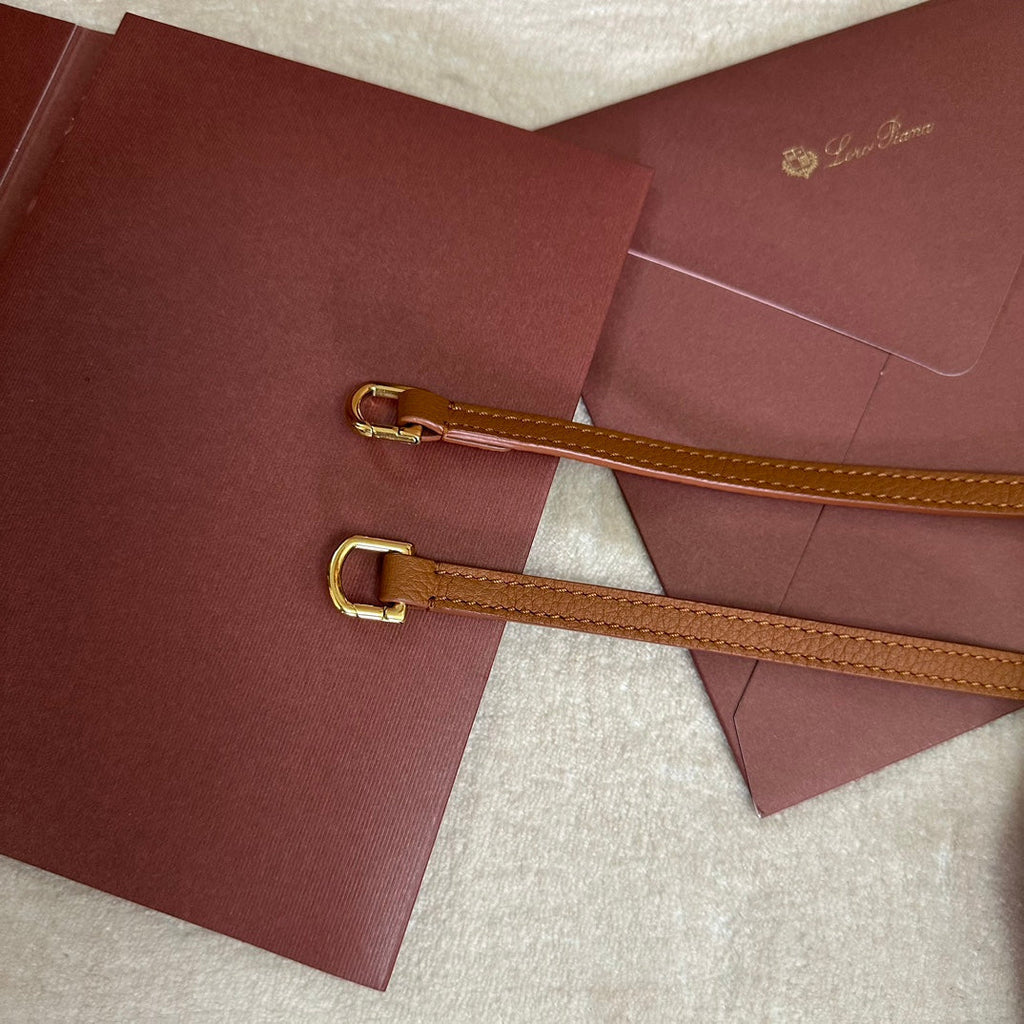 LORO PIANA EXTRA POCKET BACKPACK L23.5 IN GINGER ORANGE CALFSKIN WITH GOLD HARDWARE