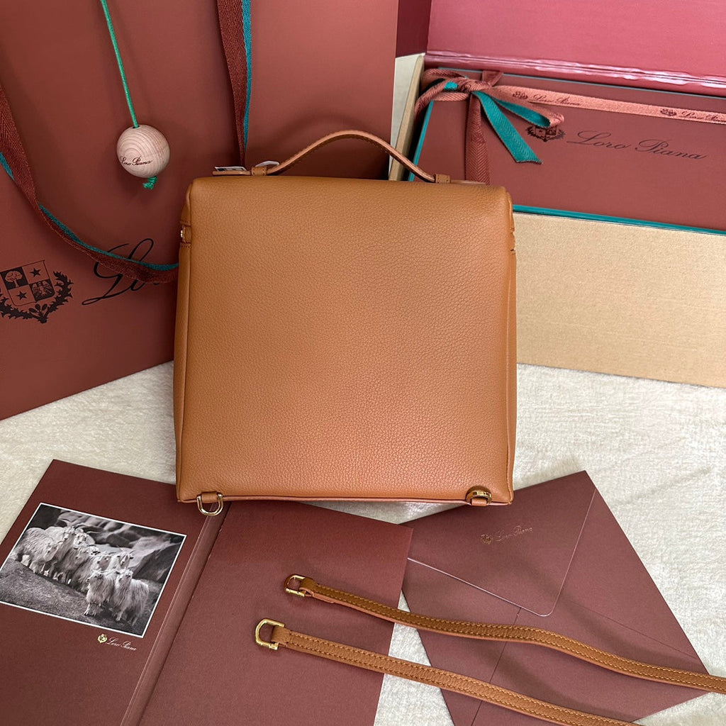 LORO PIANA EXTRA POCKET BACKPACK L23.5 IN GINGER ORANGE CALFSKIN WITH GOLD HARDWARE