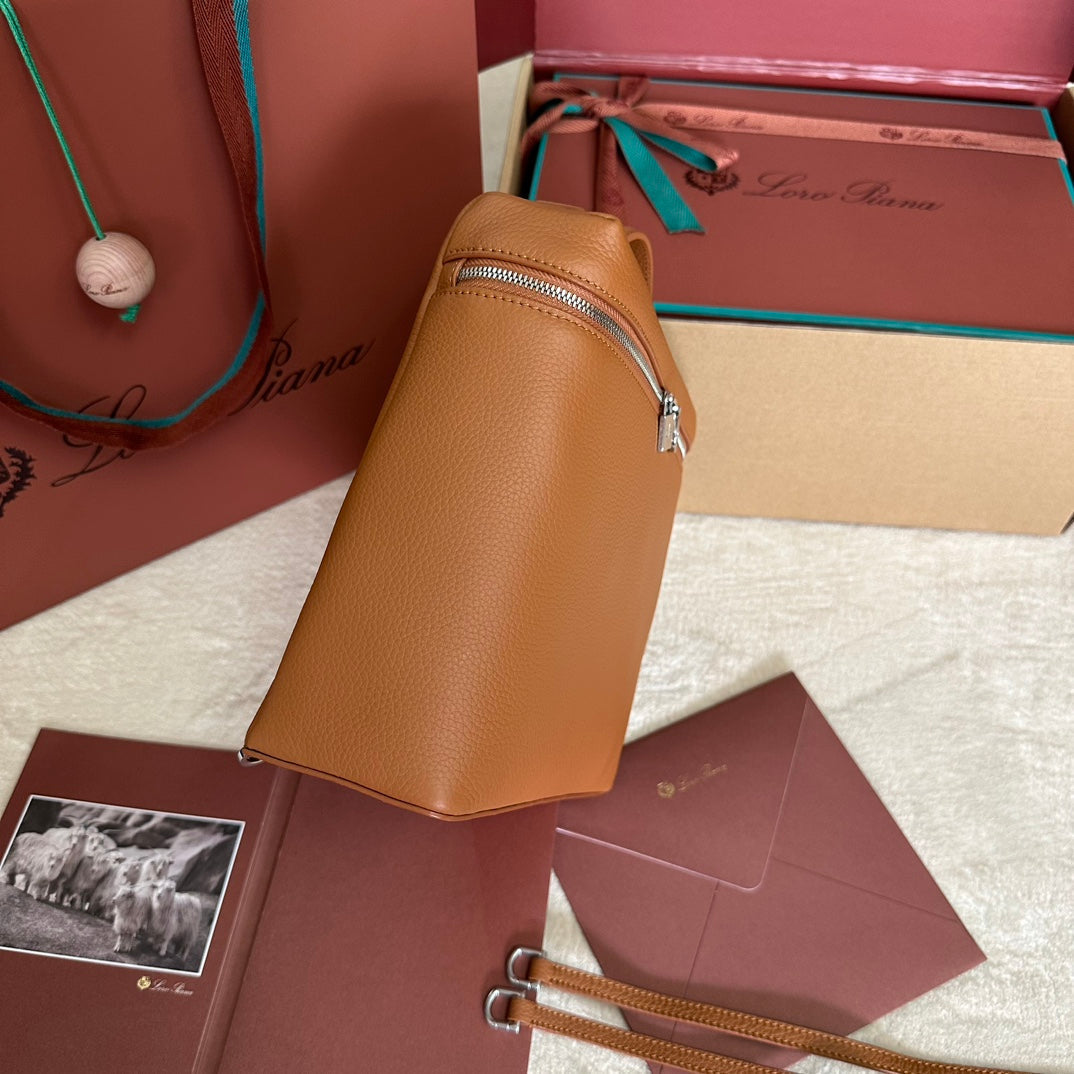 LORO PIANA EXTRA POCKET BACKPACK L23.5 IN GINGER ORANGE CALFSKIN WITH SILVER HARDWARE