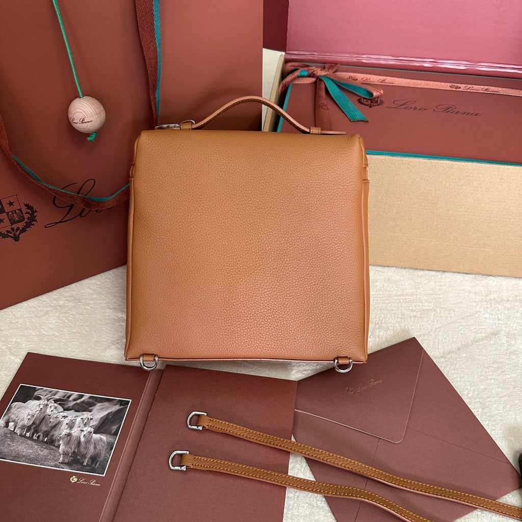 LORO PIANA EXTRA POCKET BACKPACK L23.5 IN GINGER ORANGE CALFSKIN WITH SILVER HARDWARE