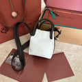 LORO PIANA MICRO BALE BAG IN WHITE FABRIC AND DARK BROWN CALFSKIN