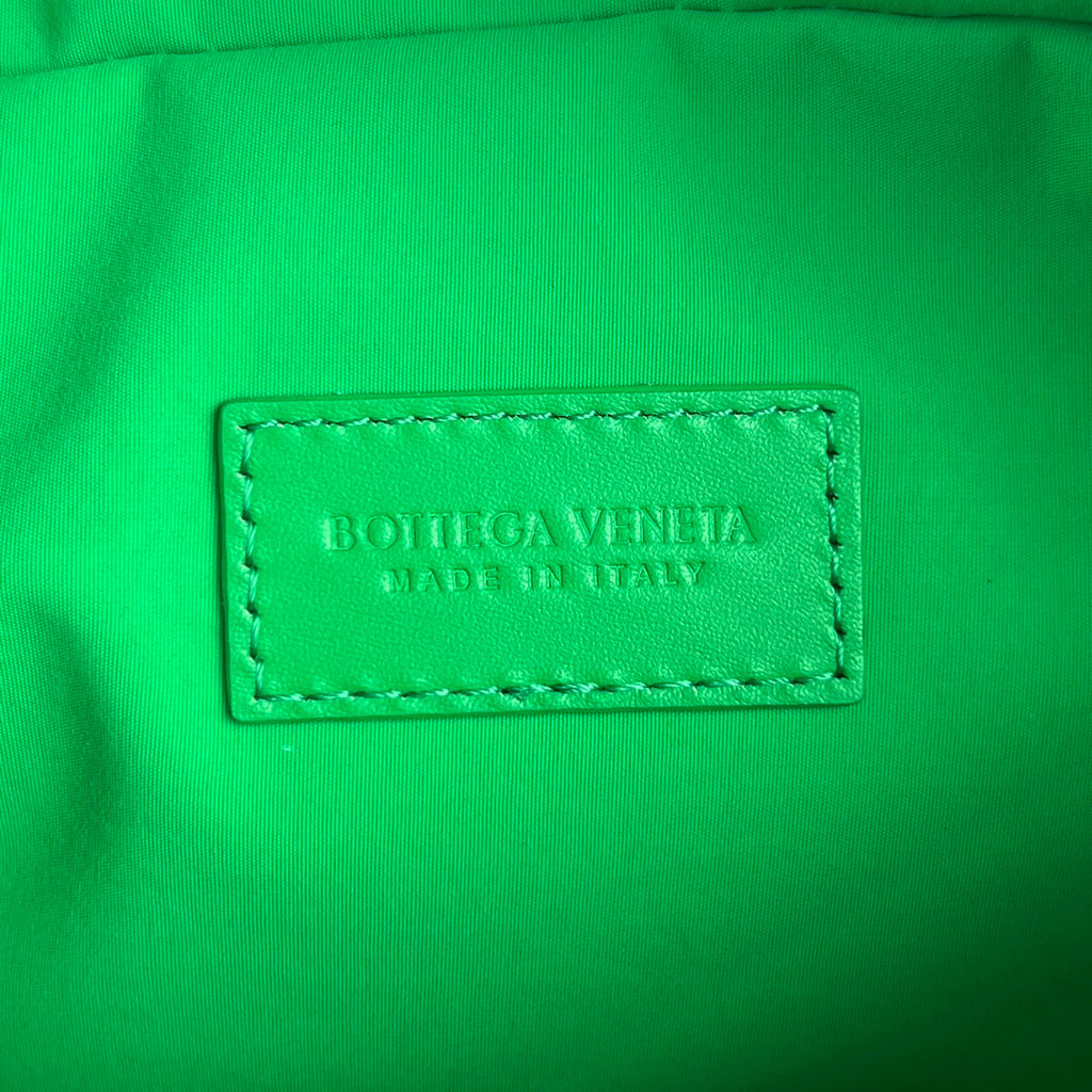 BOTTEGA VENETA INTRECCIATO CLUTCH 26 IN MALACHITE GREEN CALFSKIN