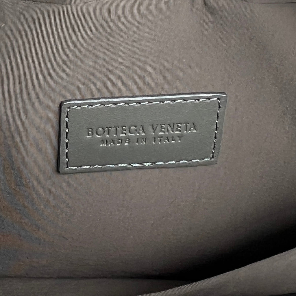 BOTTEGA VENETA INTRECCIATO CLUTCH 26 IN CORDUROY GRAY CALFSKIN