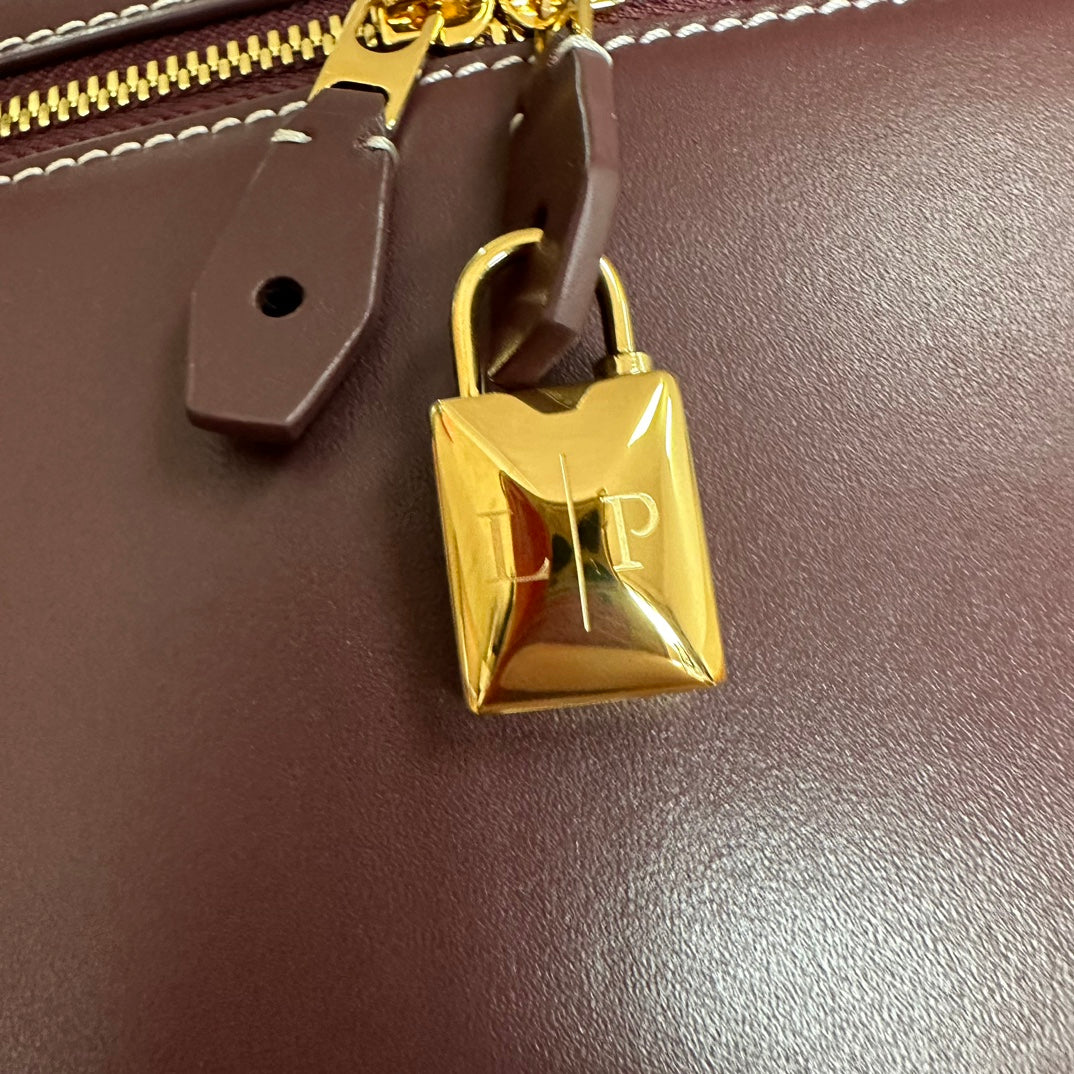 LORO PIANA EXTRA BAG L27 IN WINE PURPLE SMOOTH CALFSKIN WITH GOLD HARDWARE