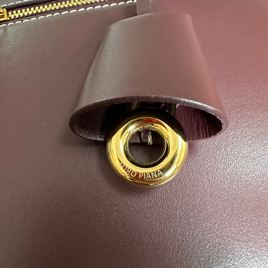 LORO PIANA EXTRA BAG L27 IN WINE PURPLE SMOOTH CALFSKIN WITH GOLD HARDWARE