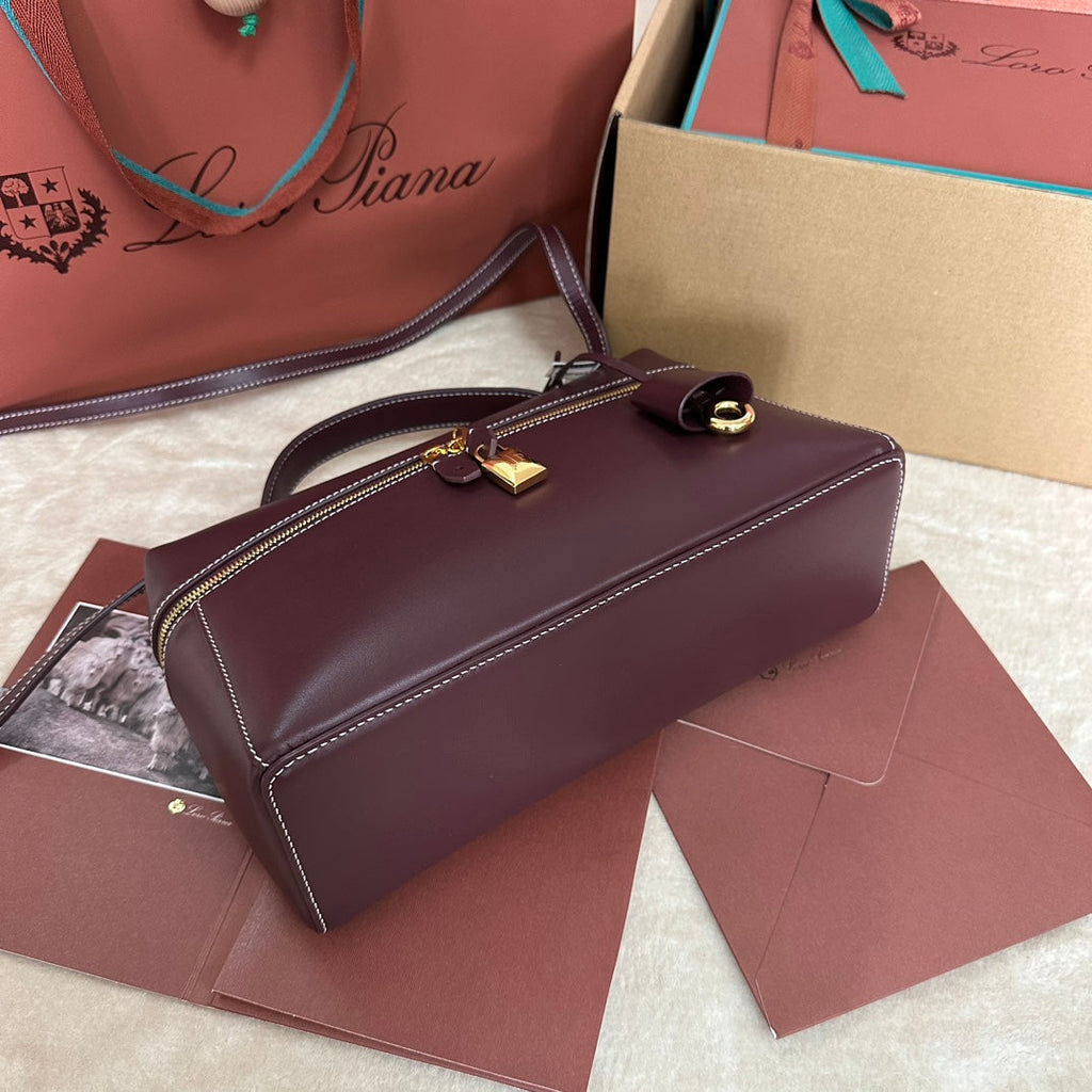 LORO PIANA EXTRA BAG L27 IN WINE PURPLE SMOOTH CALFSKIN WITH GOLD HARDWARE