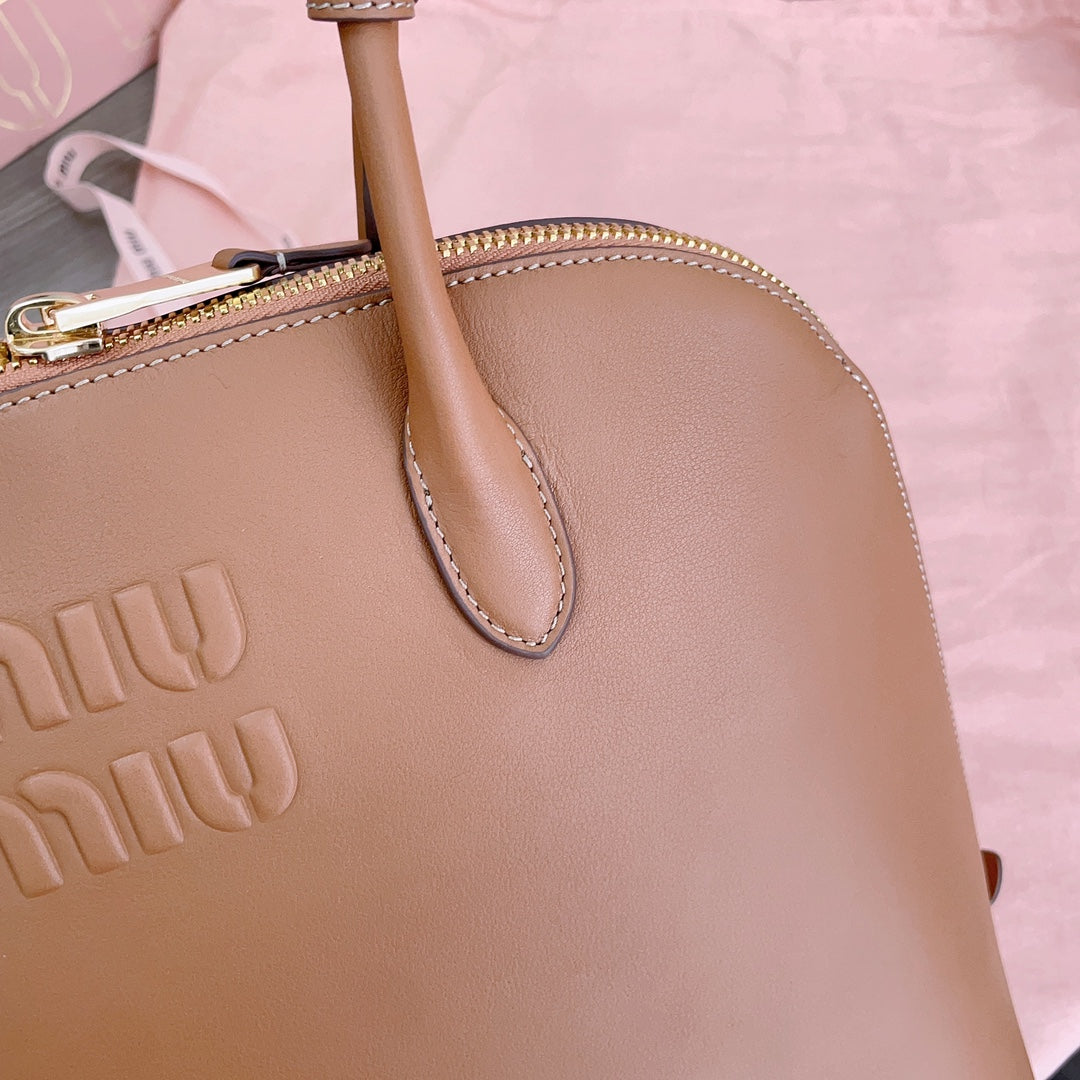 MIU MIU LARGE SHELL BAG 38 IN BRONZE BROWN CALFSKIN