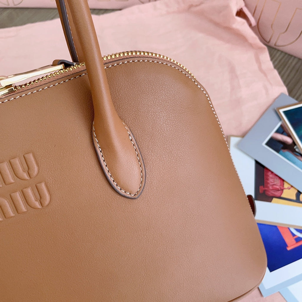MIU MIU MEDIUM SHELL BAG 33 IN BRONZE BROWN CALFSKIN
