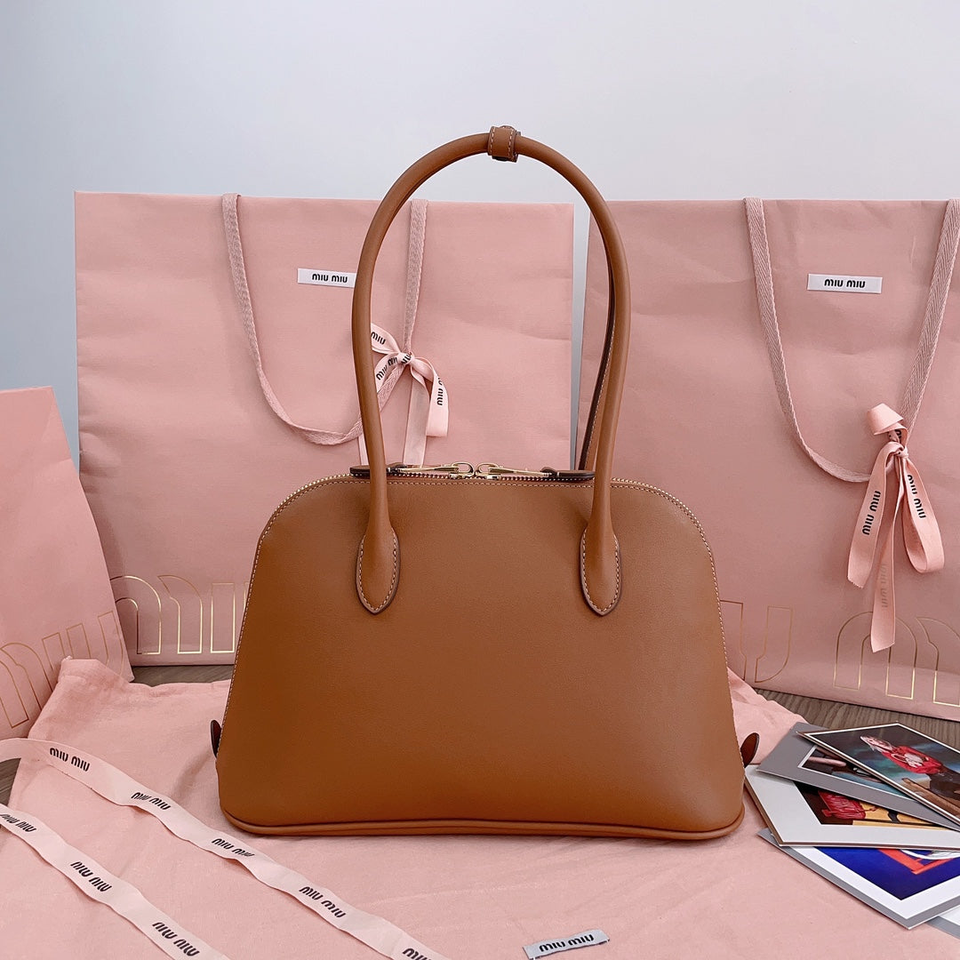 MIU MIU MEDIUM SHELL BAG 33 IN BRONZE BROWN CALFSKIN