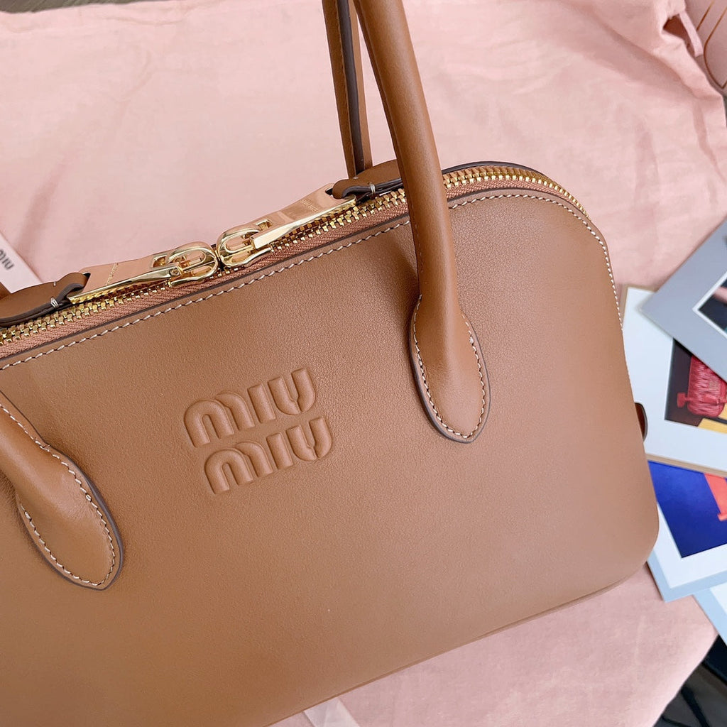 MIU MIU MEDIUM SHELL BAG 33 IN BRONZE BROWN CALFSKIN
