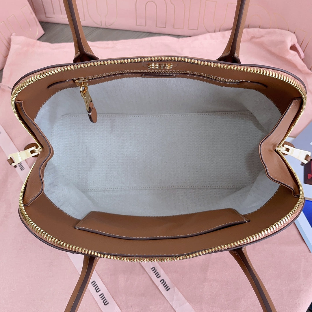 MIU MIU MEDIUM SHELL BAG 33 IN BRONZE BROWN CALFSKIN