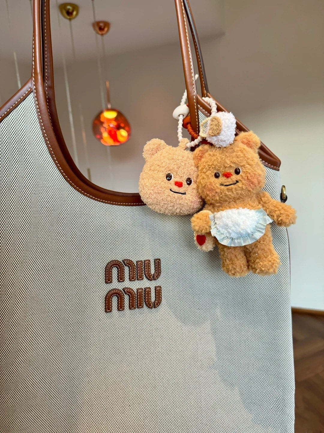 MIU MIU IVY 40 TOTE IN WHITE CANVAS