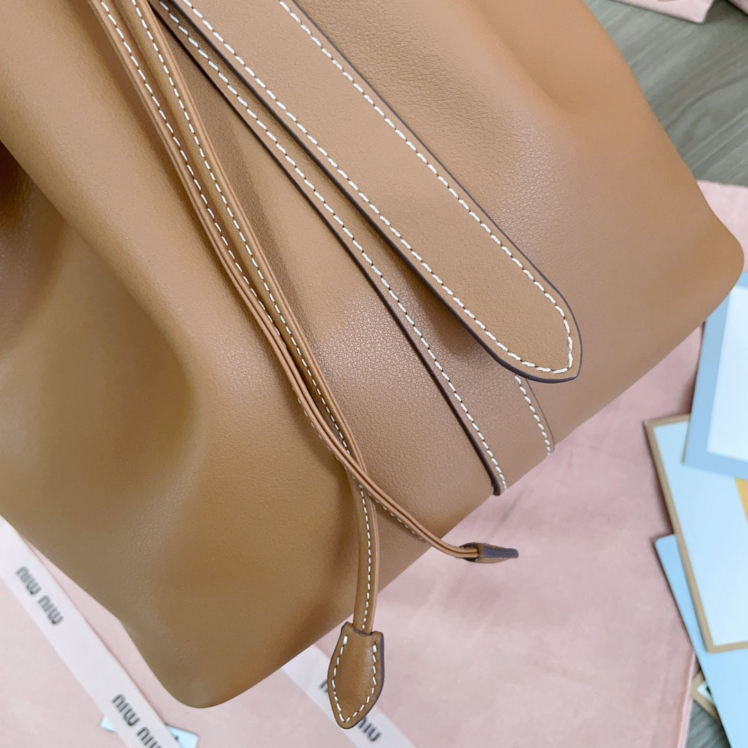 MIU MIU BUCKET BAG 29 IN BRONZE BROWN CALFSKIN