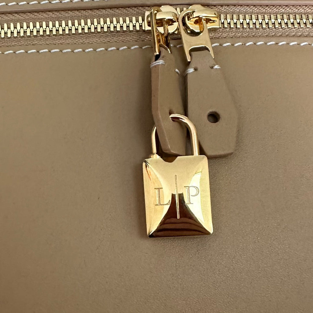 LORO PIANA EXTRA BAG L27 IN PEANUT BROWN SMOOTH CALFSKIN WITH GOLD HARDWARE