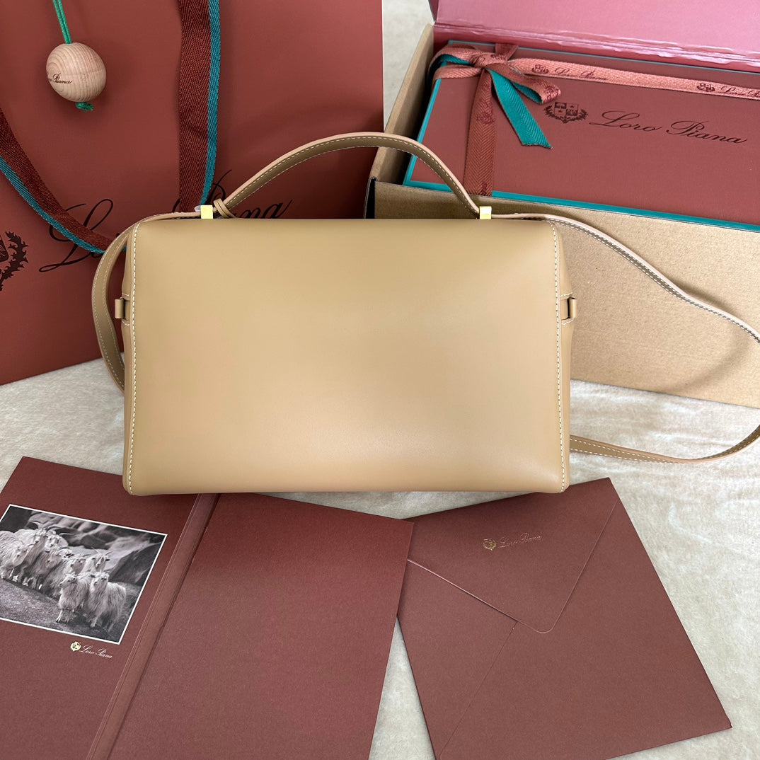 LORO PIANA EXTRA BAG L27 IN PEANUT BROWN SMOOTH CALFSKIN WITH GOLD HARDWARE