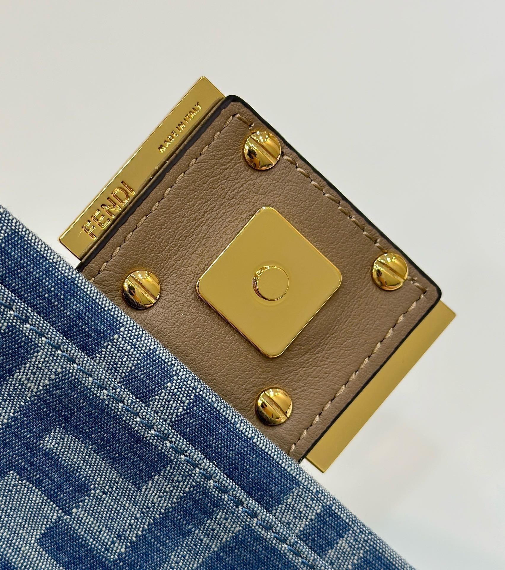 FENDI BAGUETTE MINI 19 BAG IN CERULEAN BLUE MONOGRAM DENIM WITH GOLD HARDWARE