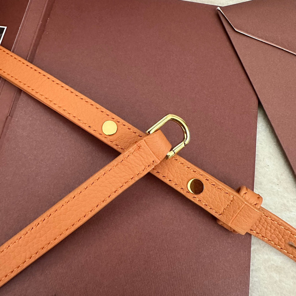 LORO PIANA EXTRA POCKET L19 IN MANGO ORANGE GRAINED CALFSKIN WITH GOLD HARDWARE
