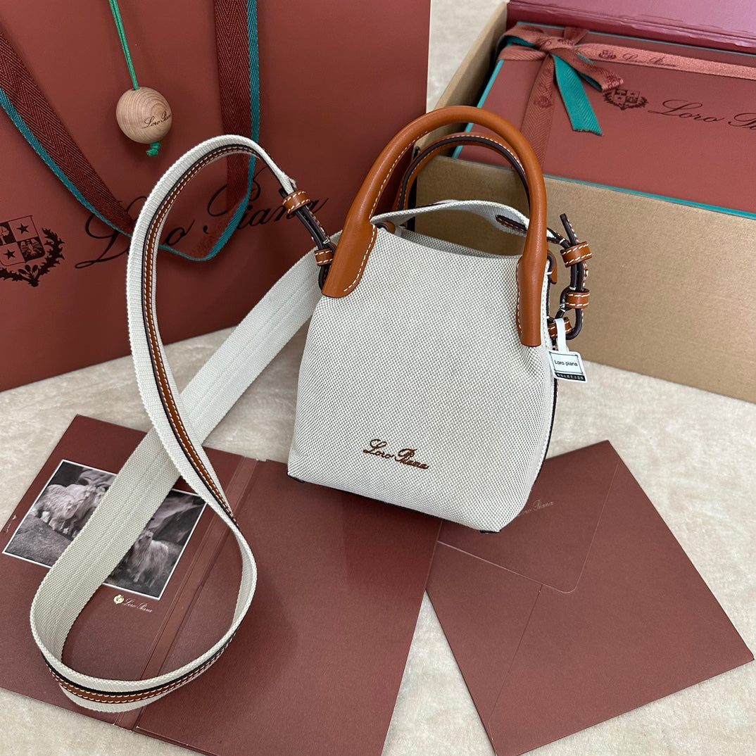 LORO PIANA MICRO BALE BAG IN WHITE CANVAS AND BRONZE BROWN CALFSKIN