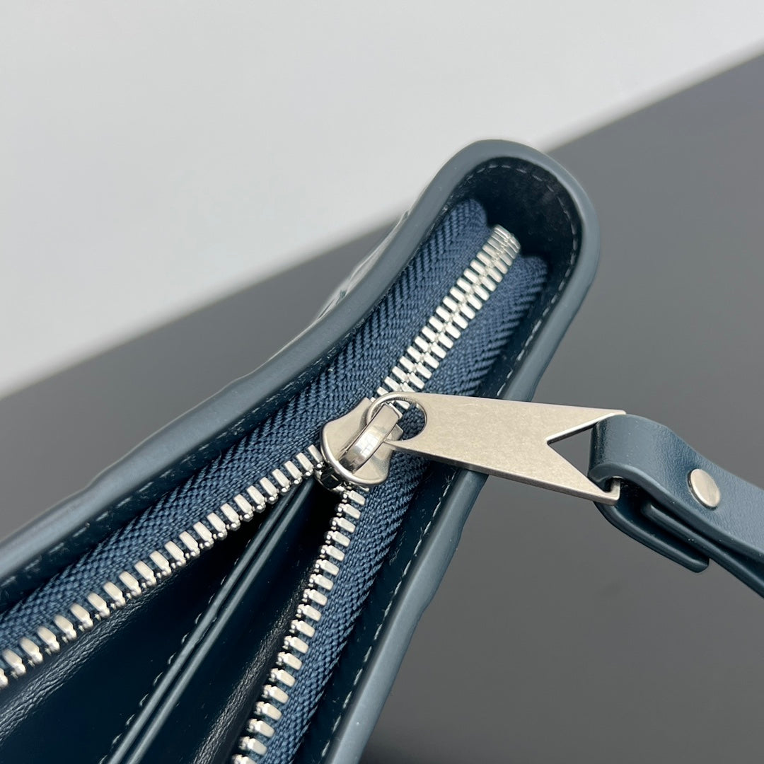BOTTEGA VENETA INTRECCIATO CLUTCH 32 IN PICKLED BLUEWOOD SOFT CALFSKIN