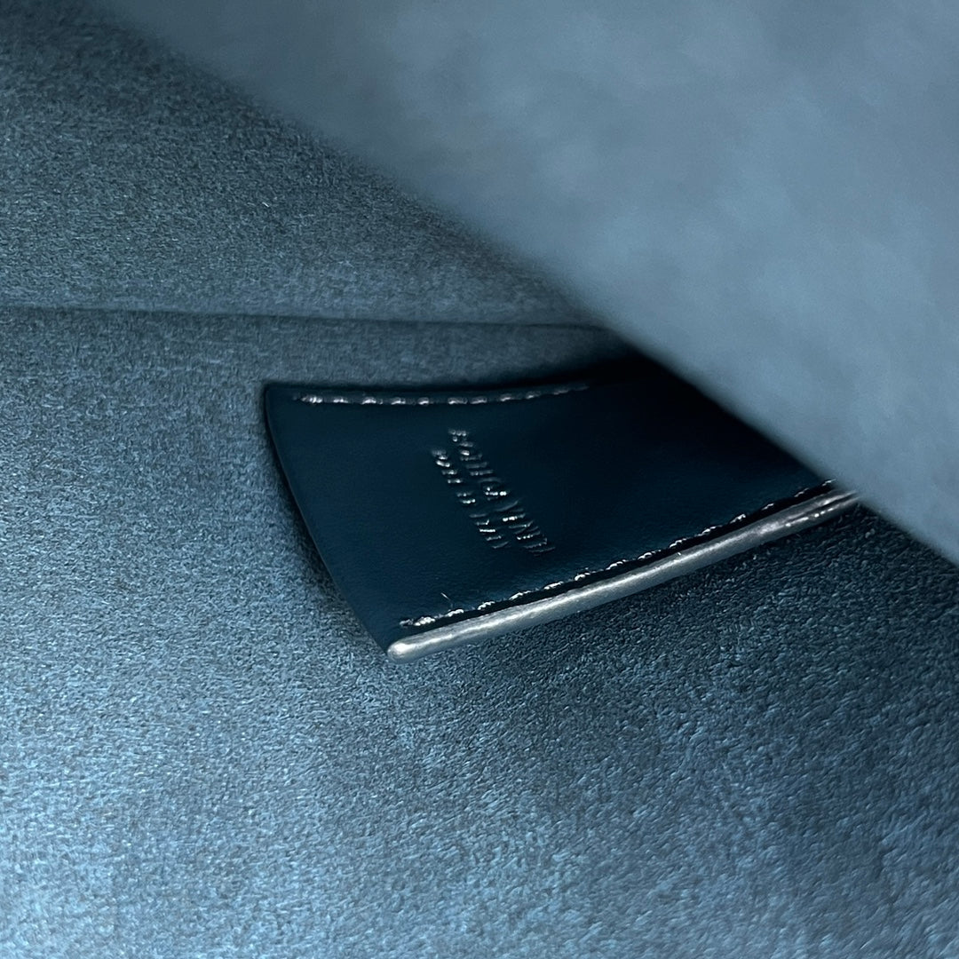 BOTTEGA VENETA INTRECCIATO CLUTCH 32 IN PICKLED BLUEWOOD SOFT CALFSKIN