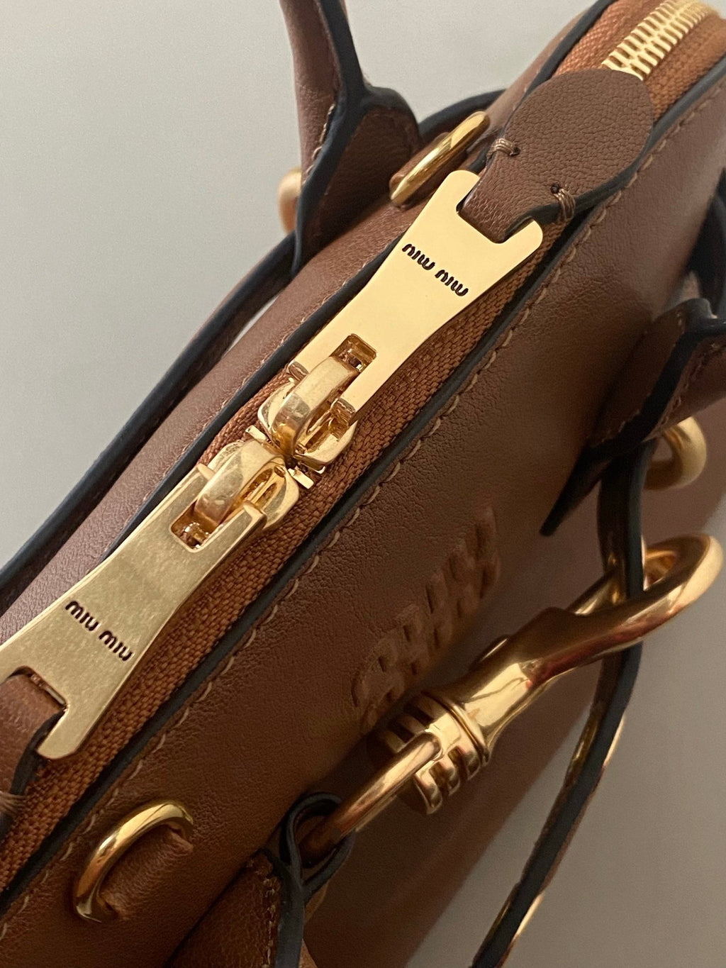 MIU MIU AVENTURE NAPPA MINI BAG 21 IN RUSSET BROWN CALFSKIN GOLD HARDWARE