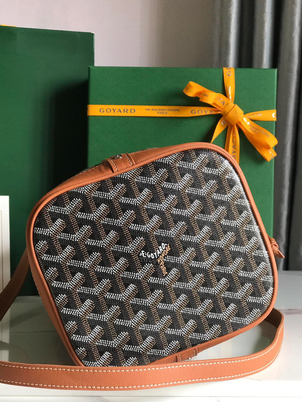GOYARD PETIT FLOT BUCKET BAG 22 IN BLACK GOYARDINE CANVAS AND TAN LAMBSKIN TRIM