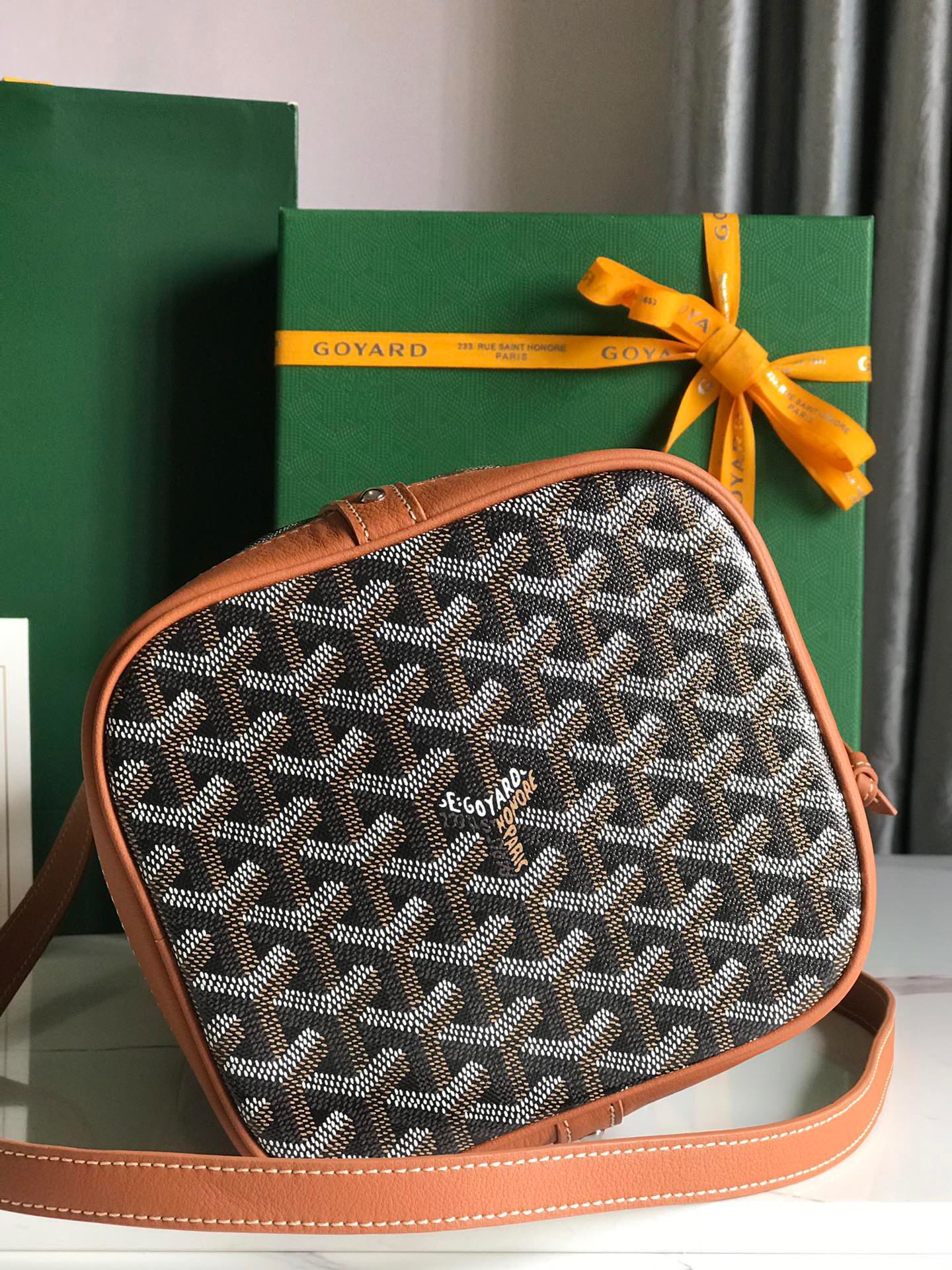 GOYARD PETIT FLOT BUCKET BAG 22 IN BLACK GOYARDINE CANVAS AND TAN LAMBSKIN TRIM