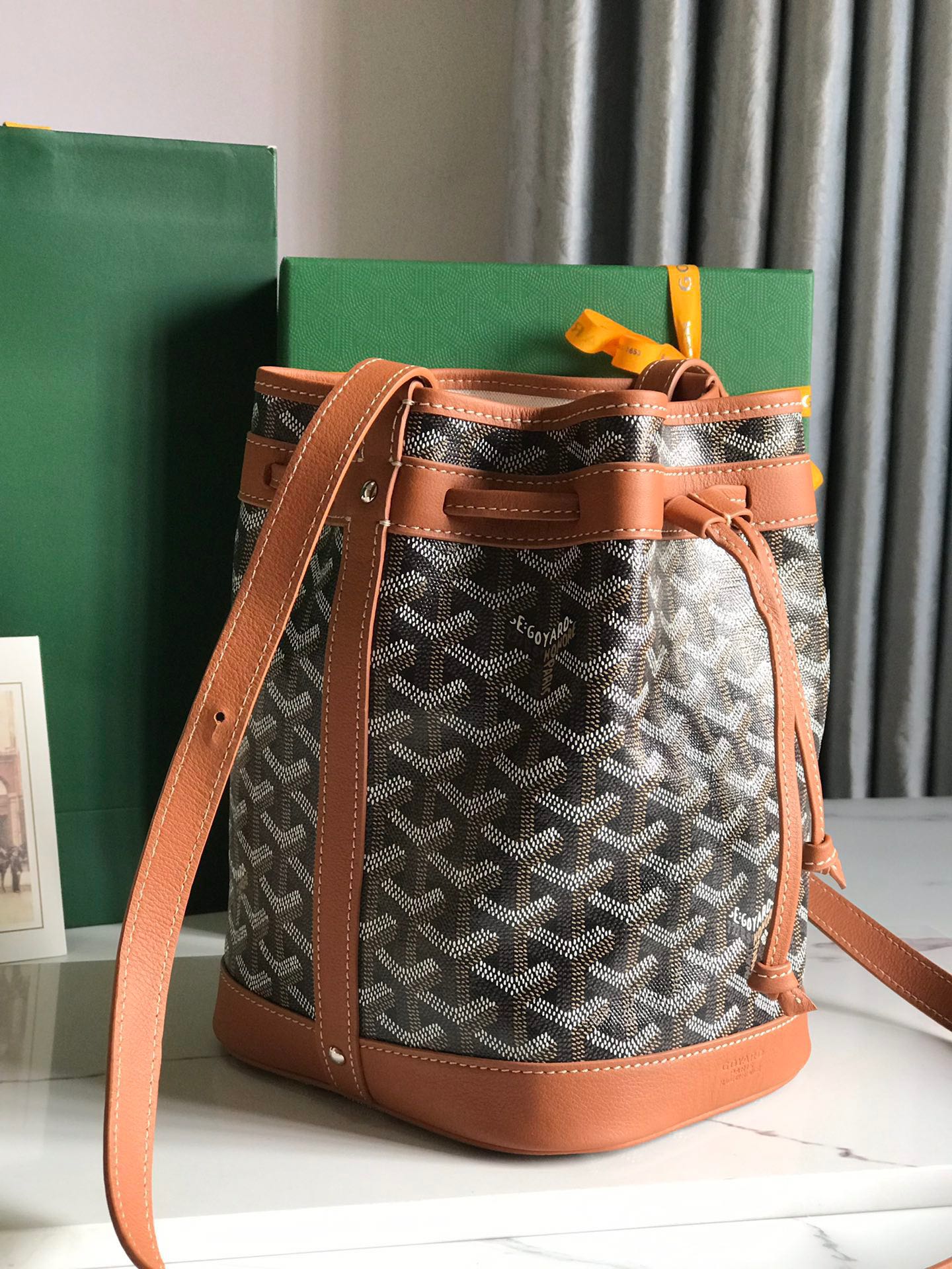 GOYARD PETIT FLOT BUCKET BAG 22 IN BLACK GOYARDINE CANVAS AND TAN LAMBSKIN TRIM
