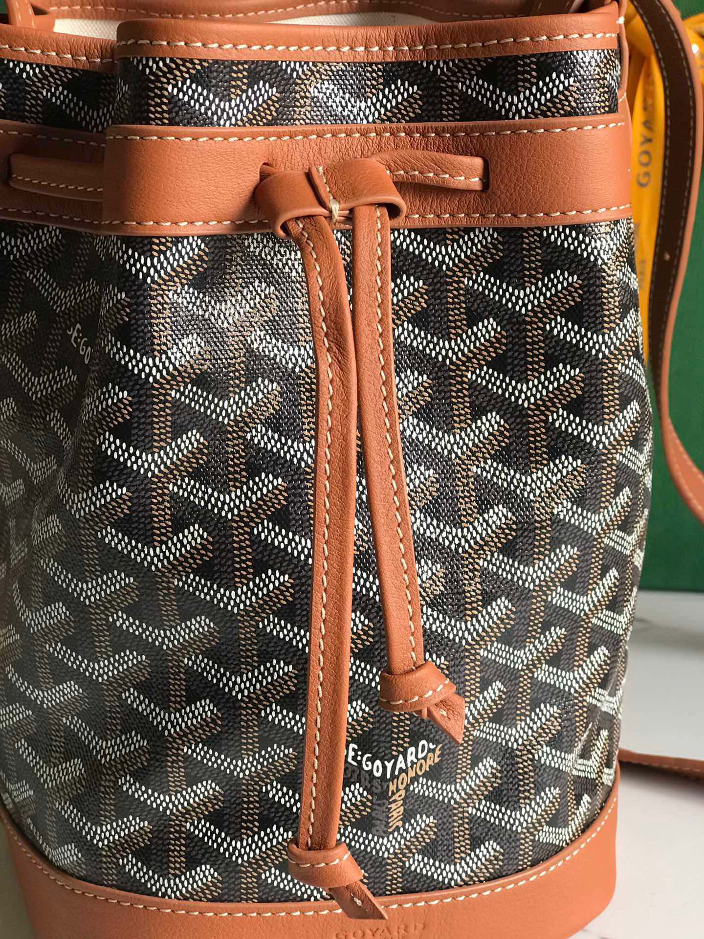 GOYARD PETIT FLOT BUCKET BAG 22 IN BLACK GOYARDINE CANVAS AND TAN LAMBSKIN TRIM