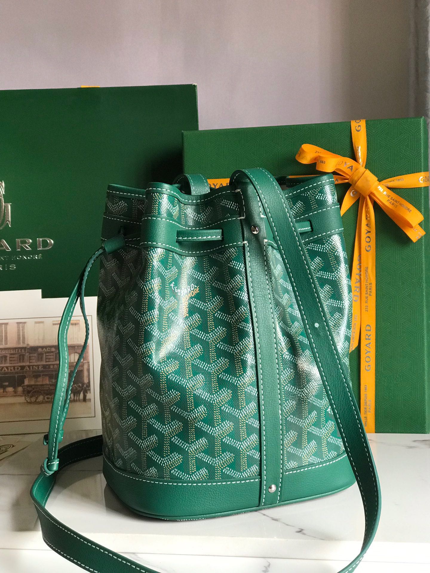 GOYARD PETIT FLOT BUCKET BAG 22 IN GREEN GOYARDINE CANVAS AND LAMBSKIN TRIM