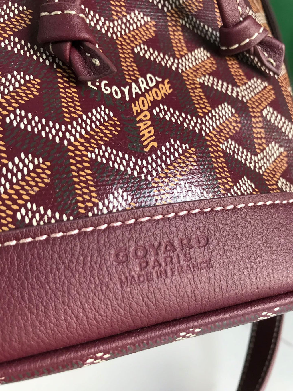 GOYARD PETIT FLOT BUCKET BAG 22 IN WINE RED GOYARDINE CANVAS AND LAMBSKIN TRIM