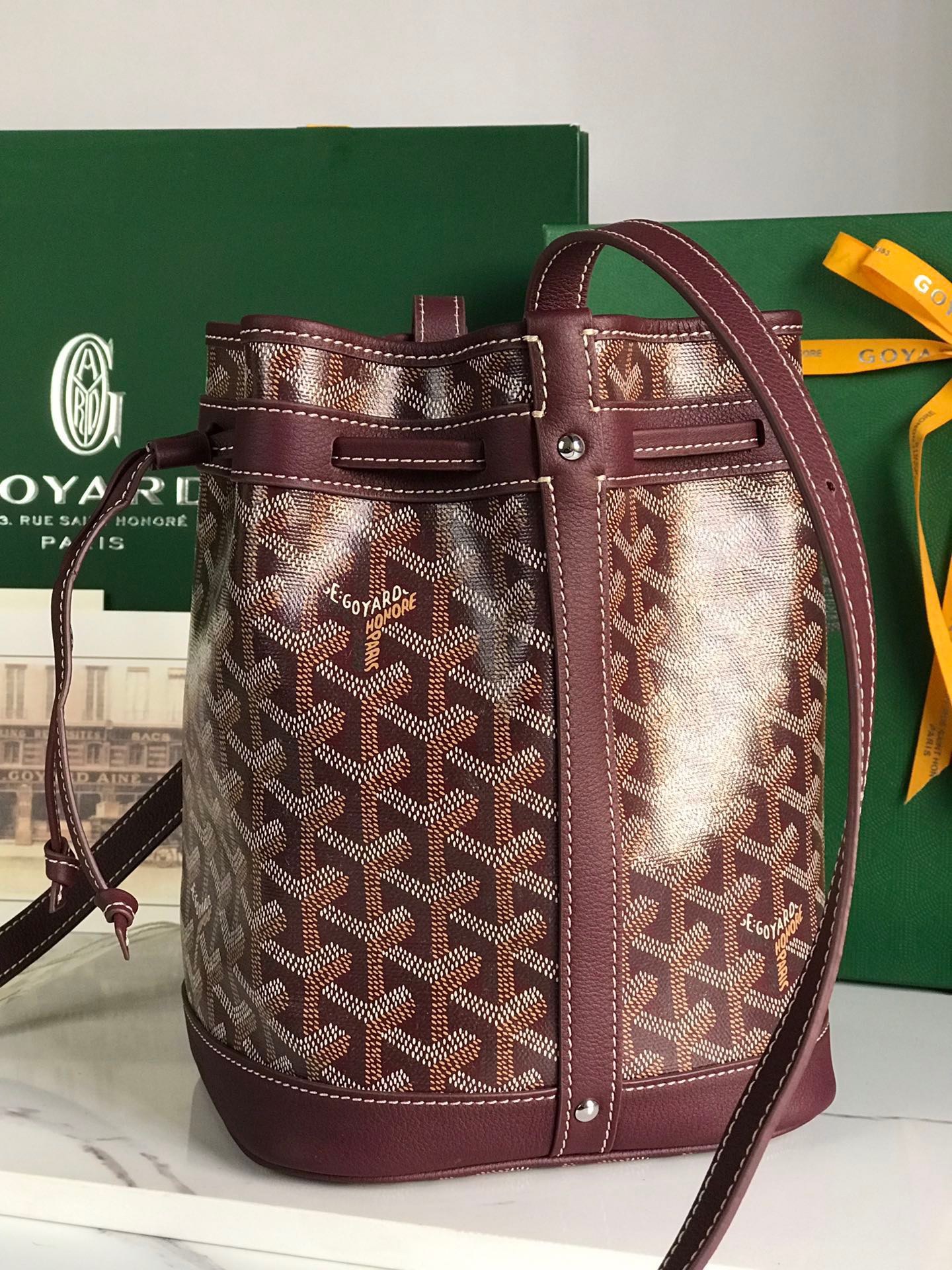 GOYARD PETIT FLOT BUCKET BAG 22 IN WINE RED GOYARDINE CANVAS AND LAMBSKIN TRIM