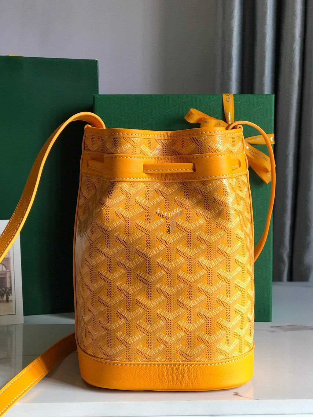 GOYARD PETIT FLOT BUCKET BAG 22 IN YELLOW GOYARDINE CANVAS AND LAMBSKIN TRIM