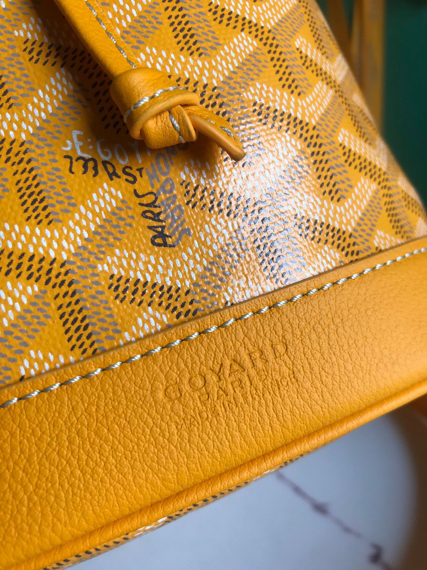 GOYARD PETIT FLOT BUCKET BAG 22 IN YELLOW GOYARDINE CANVAS AND LAMBSKIN TRIM