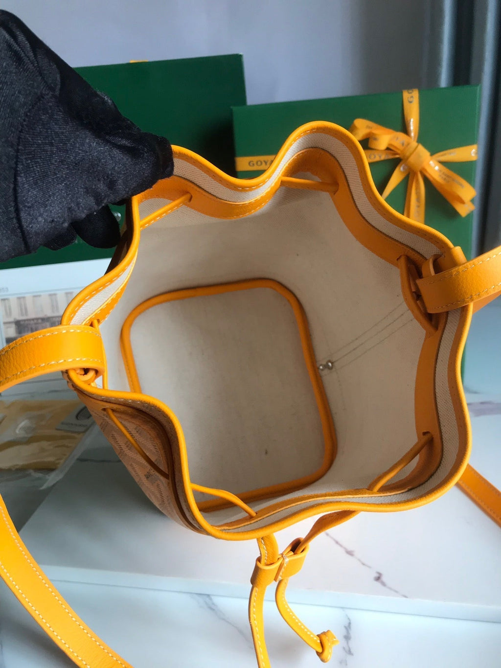 GOYARD PETIT FLOT BUCKET BAG 22 IN YELLOW GOYARDINE CANVAS AND LAMBSKIN TRIM