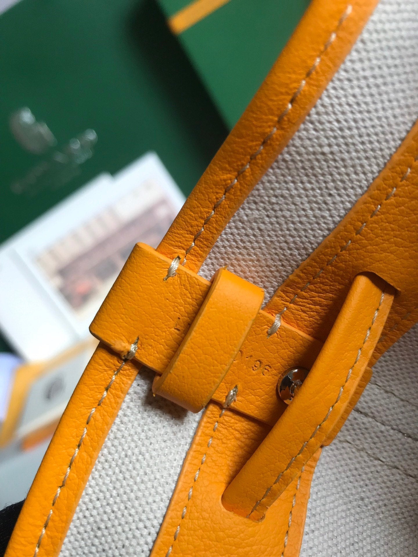 GOYARD PETIT FLOT BUCKET BAG 22 IN YELLOW GOYARDINE CANVAS AND LAMBSKIN TRIM
