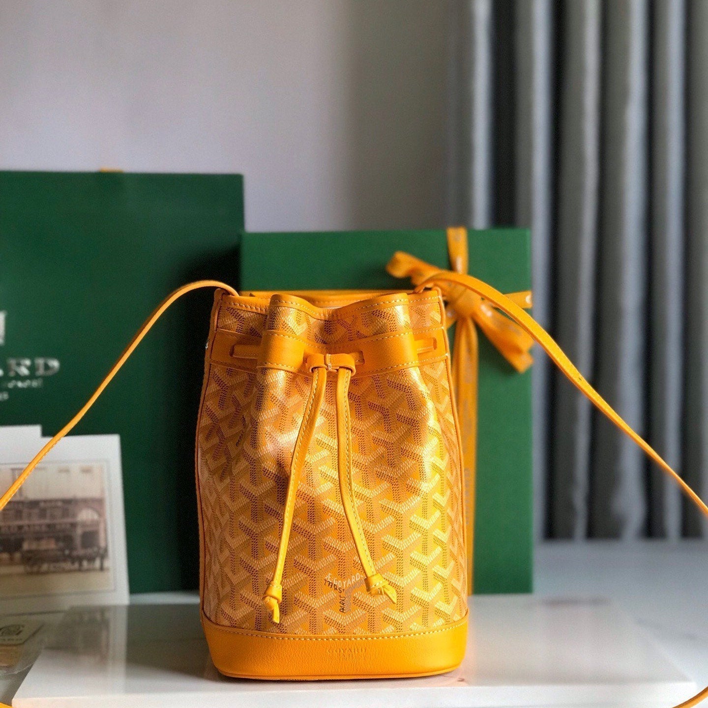 GOYARD PETIT FLOT BUCKET BAG 22 IN YELLOW GOYARDINE CANVAS AND LAMBSKIN TRIM