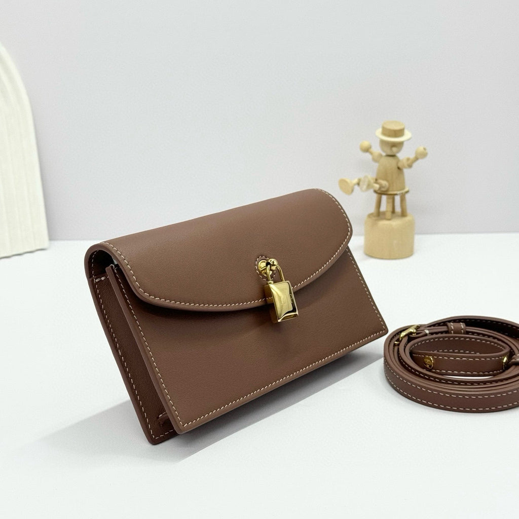 LORO PIANA EXTRA POCHETTE 18 IN CARAMEL SUGAR CALFSKIN GOLD HARDWARE